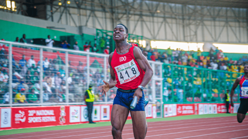 Man running on a Track and Field