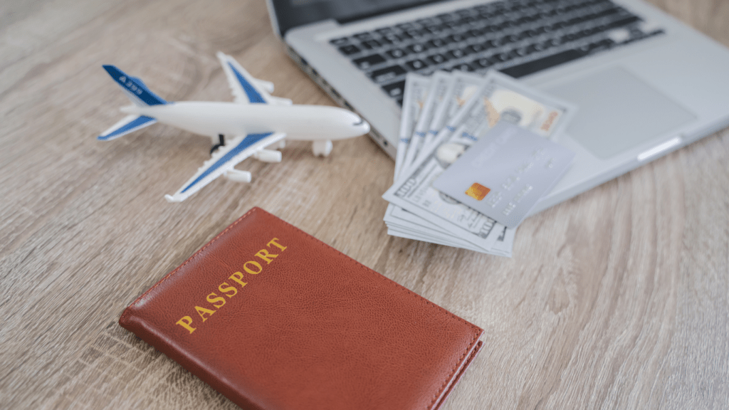 Passport, money and airplane concept